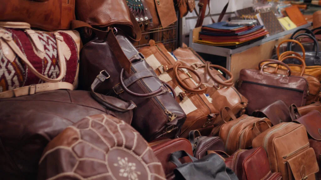 marrakech-market-stalls-in-medina-old-city-bags-and-leatherin-marocco-marketplace-craf-SBI-350442795